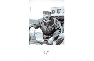 Sterling Moss Autograph a Signed Page Together With an 8x10 Photograph